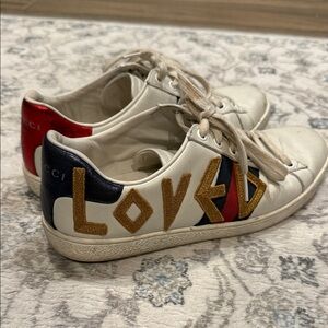 Gucci White Sneakers with Gold and Red Details